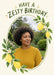 Yellow lemons, white citrus blossom and green leaves surround a tilted oval photo frame on cream, beneath green hand-lettered birthday wording.
