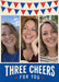 Red and blue triangular bunting hangs above three tall photo frames, with cream condensed lettering on a deep blue panel below.