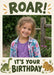 Two small illustrated dinosaurs sit below a large rectangular photo on cream, with leafy marks and bold olive-green birthday lettering.