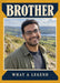 A cream-bordered portrait photo sits on mustard yellow between navy banner panels carrying bold cream serif lettering.