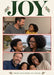 Three red-bordered landscape photos stack beneath oversized green serif joy lettering on cream, with small festive leafy sprigs and red berries.
