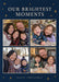 Four cream-bordered photos form a grid on deep navy, with scattered ochre stars and spaced cream serif Christmas wording.