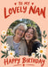 Lovely Nan birthday photo card with cream flowers, green leaves, a peach background and red lettering, shown with two smiling women outdoors.