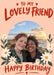Lovely Friend birthday photo card with cream flowers, green leaves, a peach background and red lettering, shown with two smiling women by the coast at sunset.