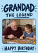 Grandad the Legend birthday photo card with navy lettering, a pale blue background and yellow star, shown with an older man and a child doing a jigsaw together.