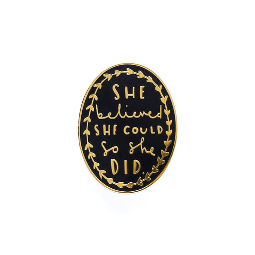 she believed black and gold enamel pin